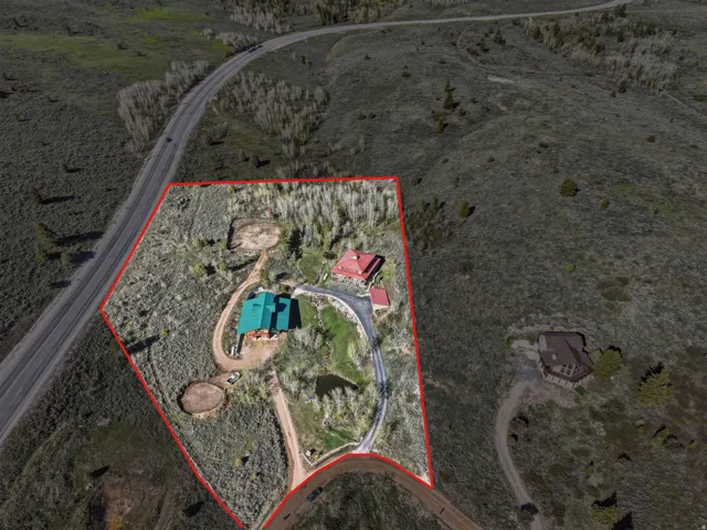 Aerial Property Boundary Survey. Outlining the property's perimeter and structures