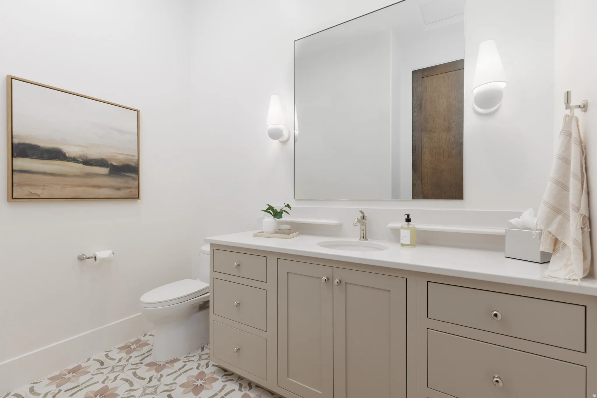 Bathroom featuring toilet and vanity