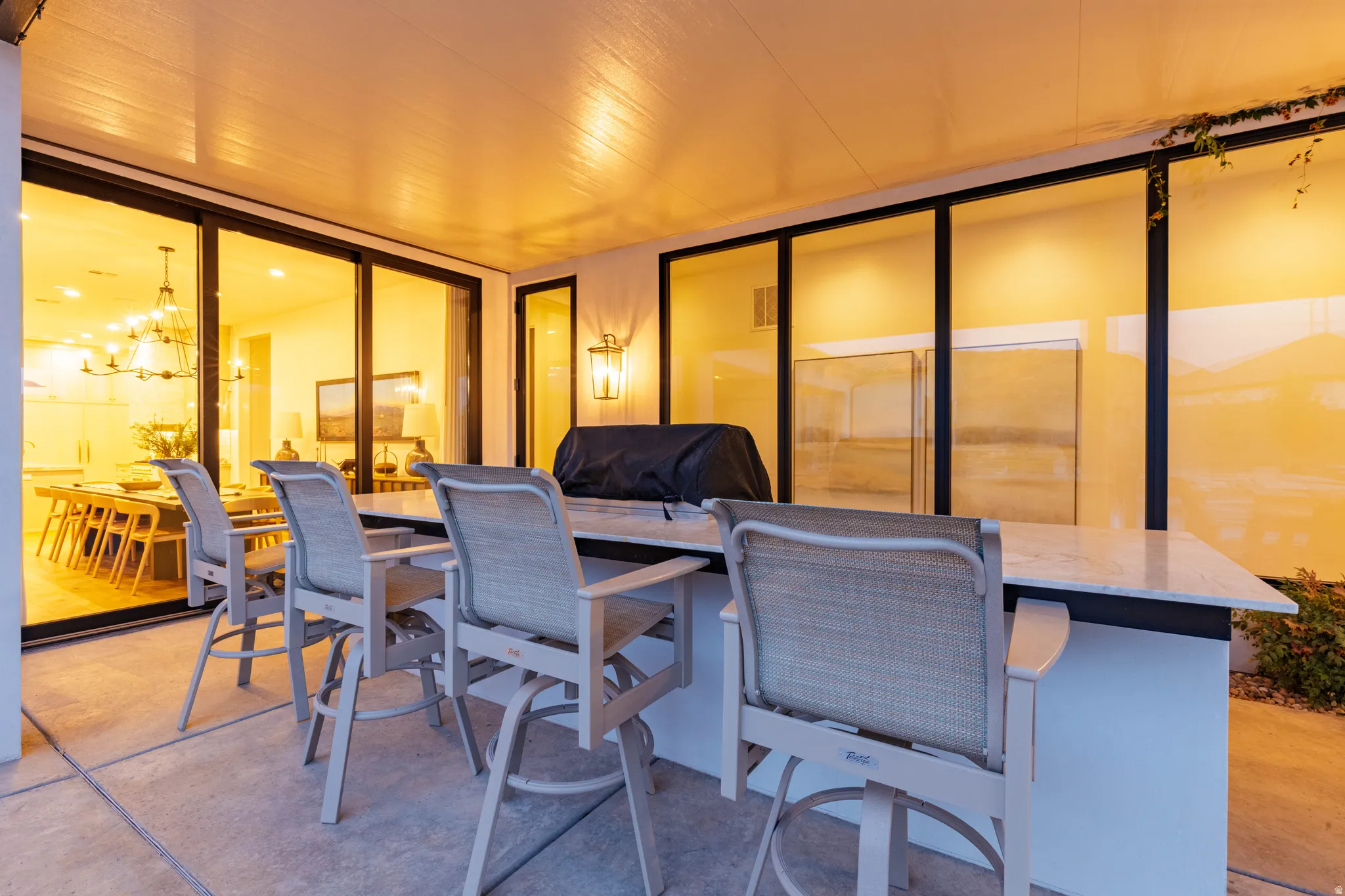 View of patio with outdoor dining area