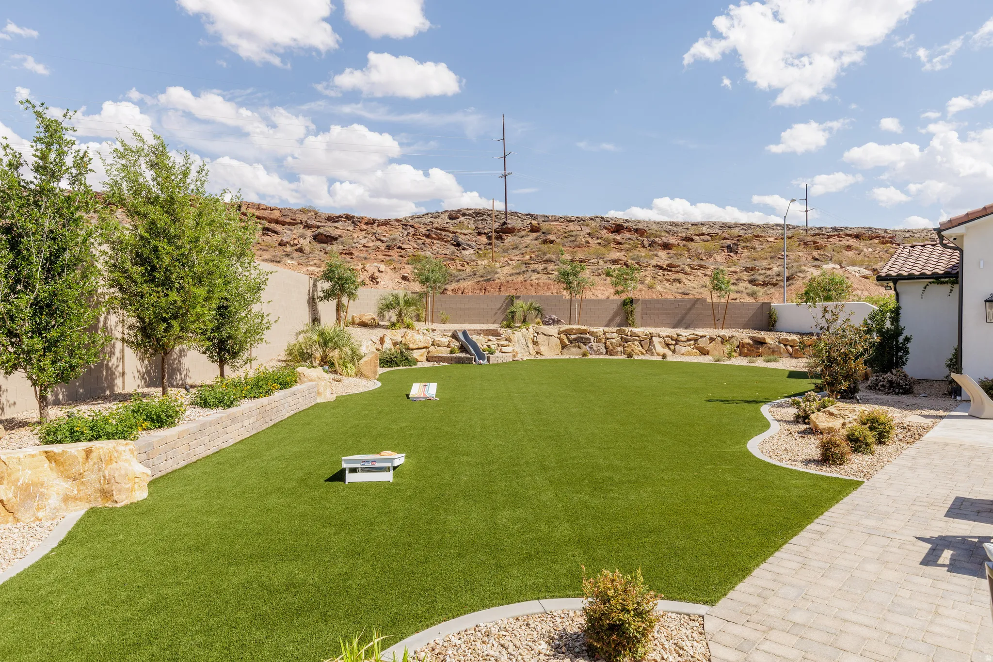 Fenced backyard featuring a patio area