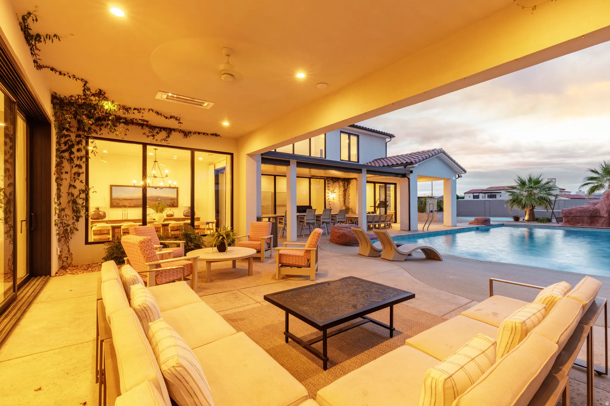 Exterior space featuring an outdoor lounge area and a patio
