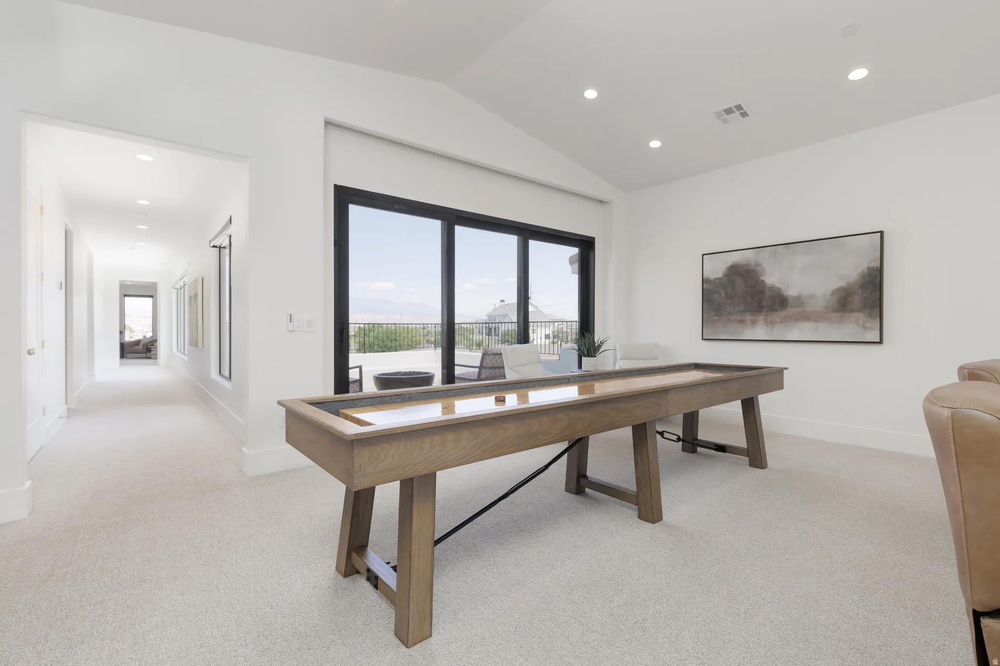 Game room featuring light carpet and recessed lighting