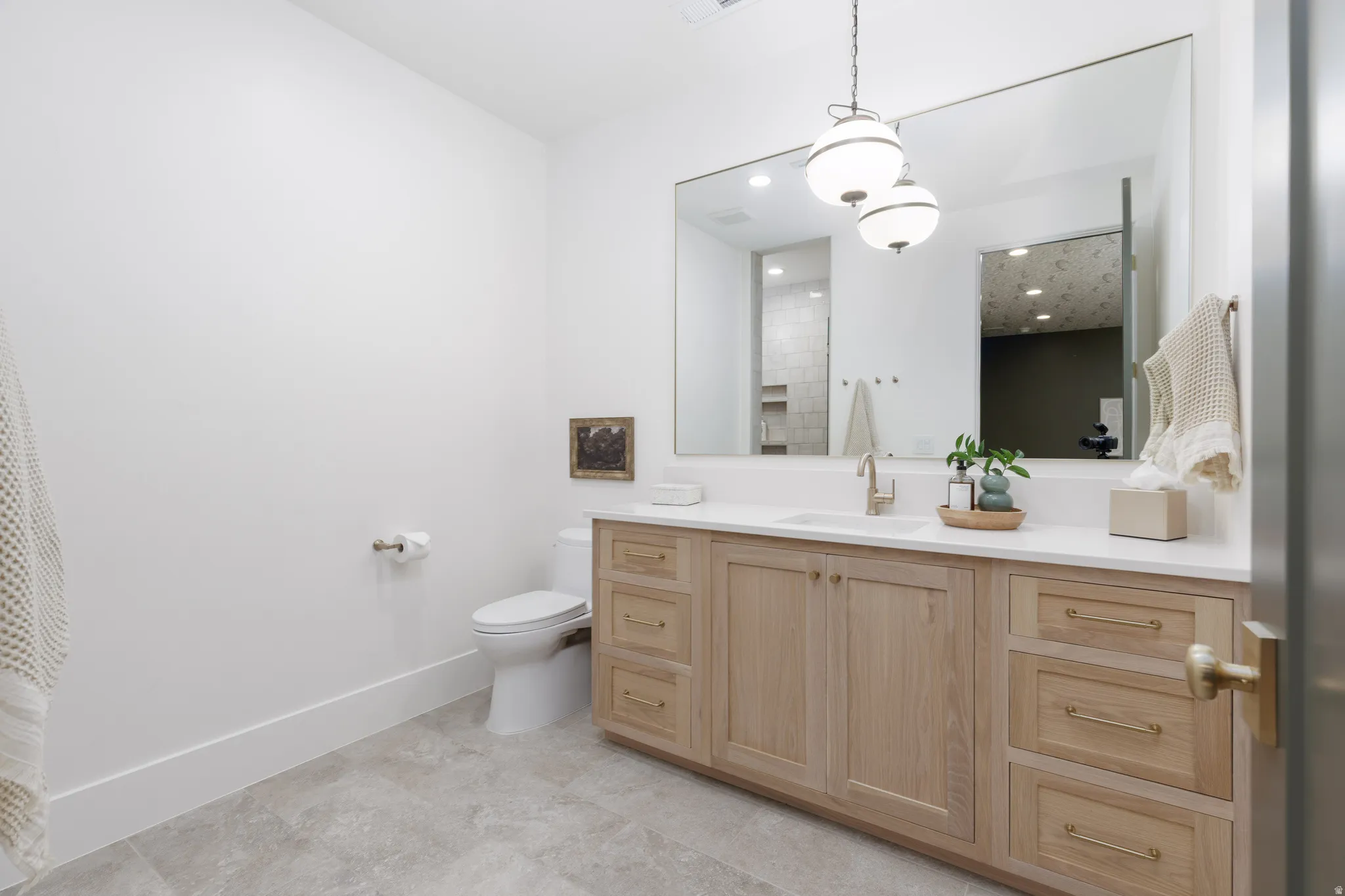 Full bath with vanity and a shower with curtain