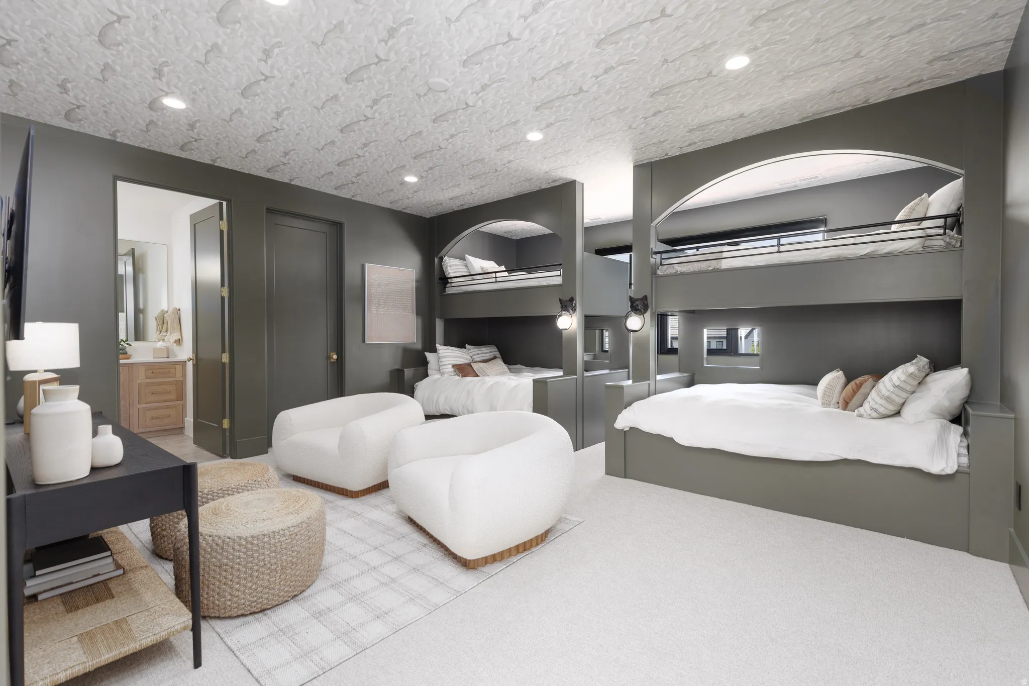 Carpeted bedroom with recessed lighting and a textured ceiling