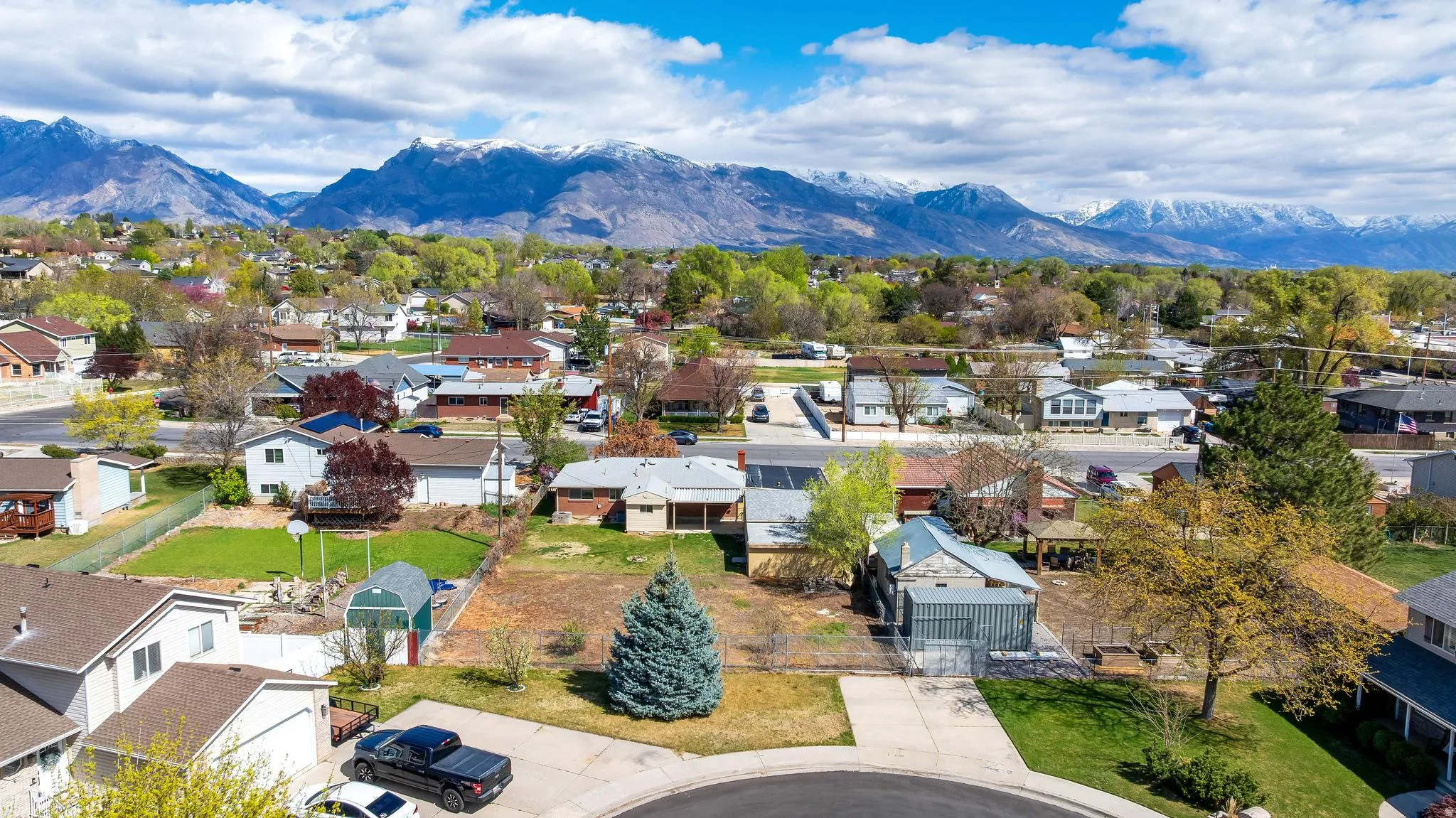 Aerial view of residential area with a mountain backdrop
