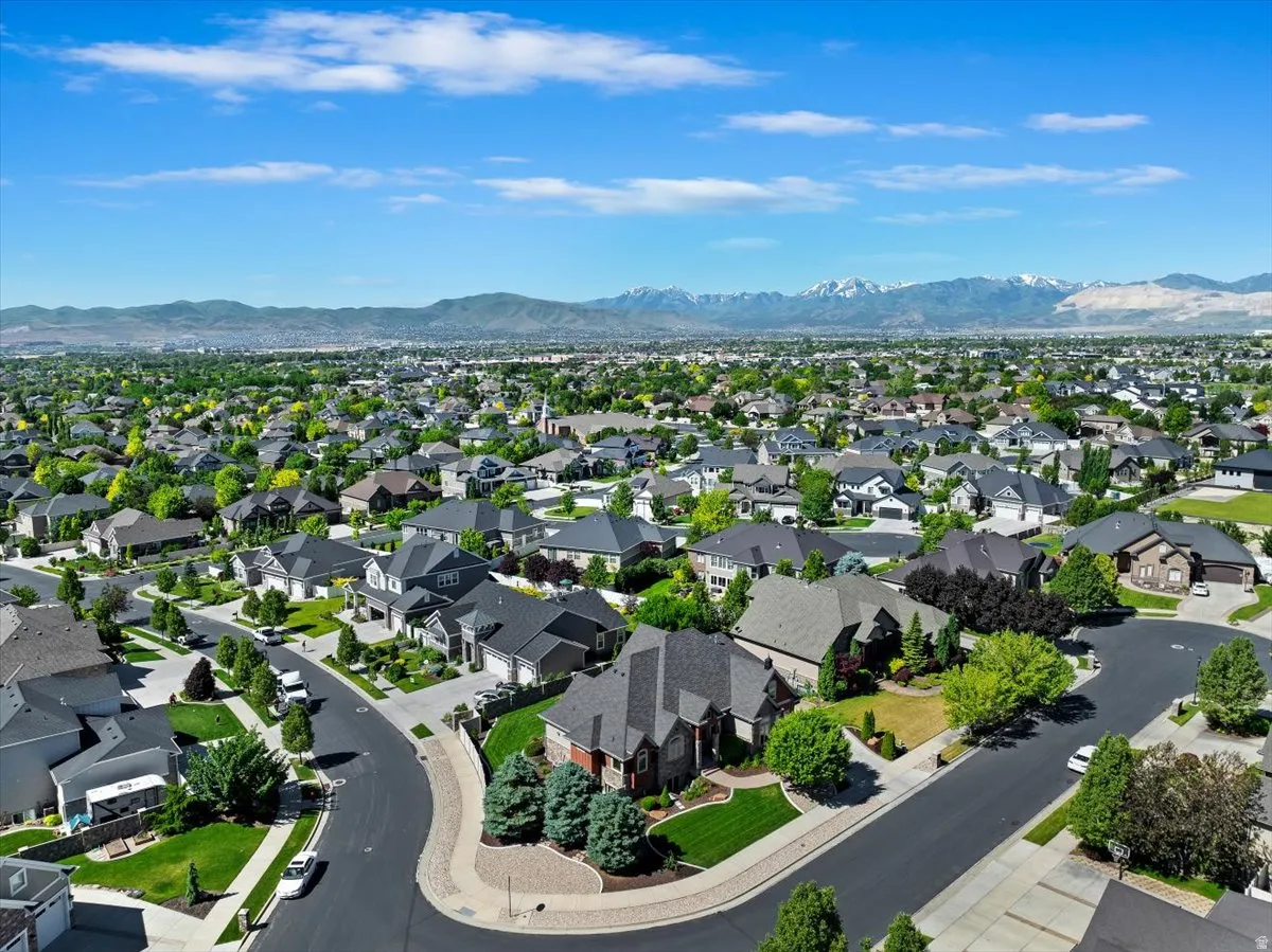 Expansive residential neighborhood featuring paved streets and manicured lawns