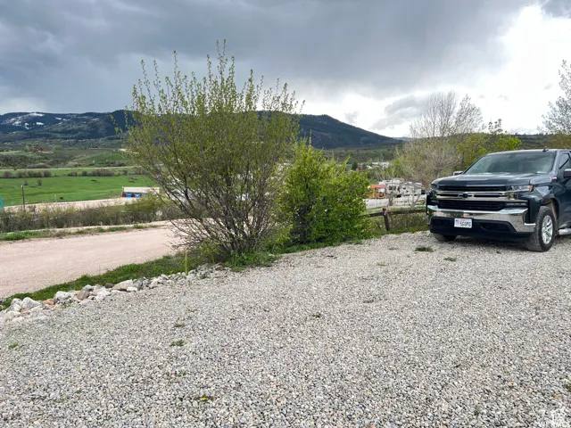 Expansive gravel lot offering outdoor parking