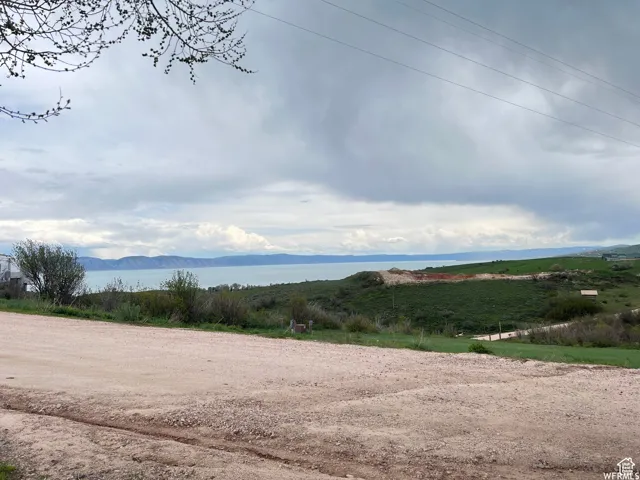 Expansive water body with distant mountain ranges