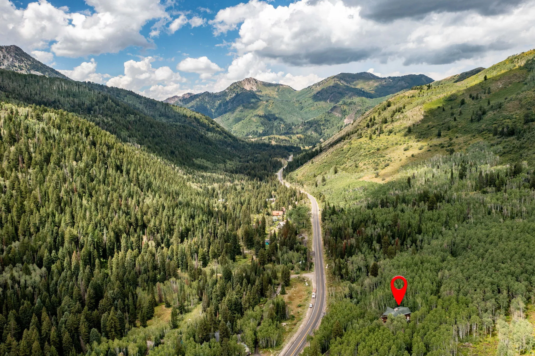 Mountain valley property surrounded by dense forest