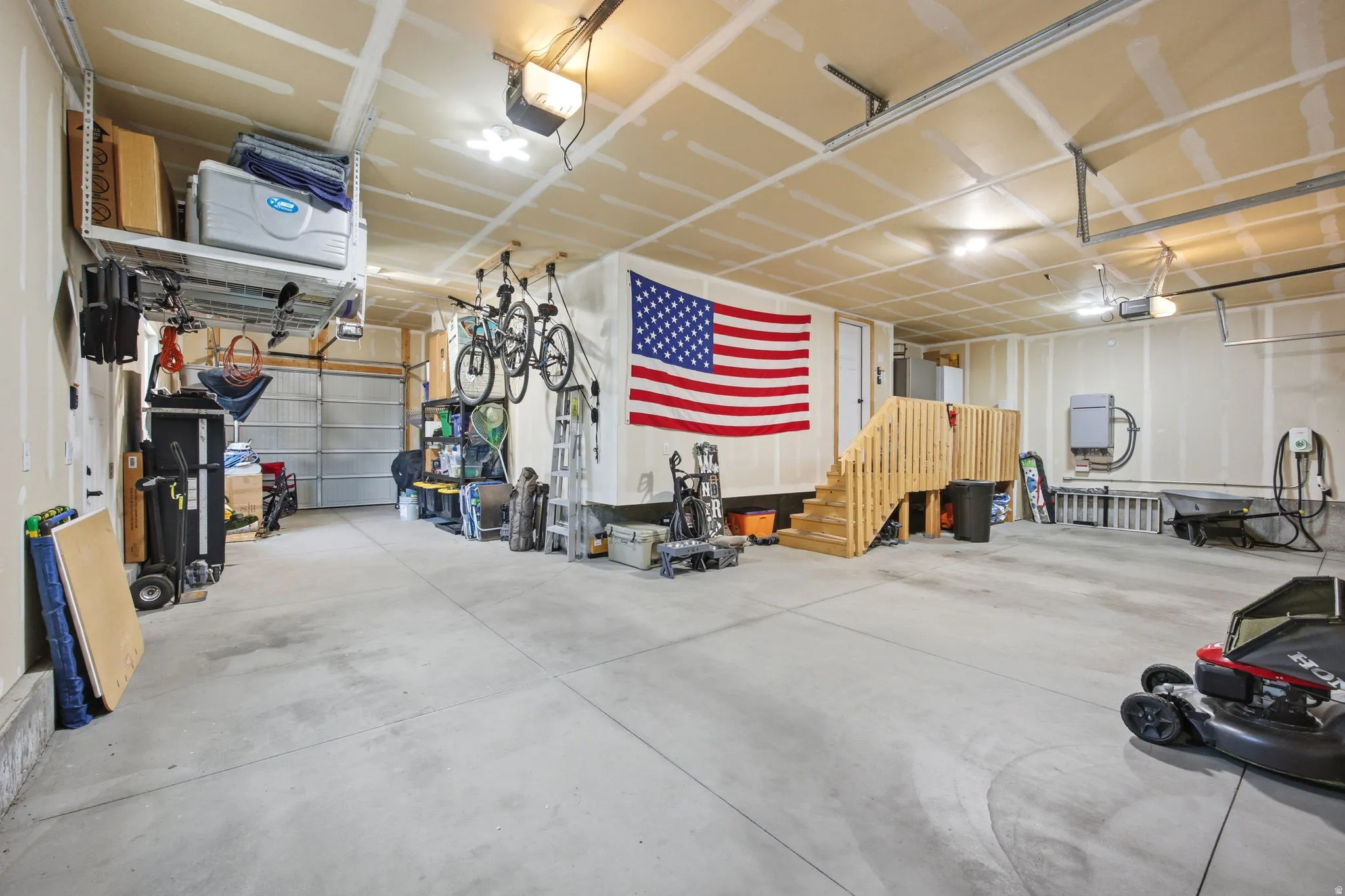 3rd car garage goes all the way back so you can fit 2 cars with a 3 Garage door opener to the back of the home