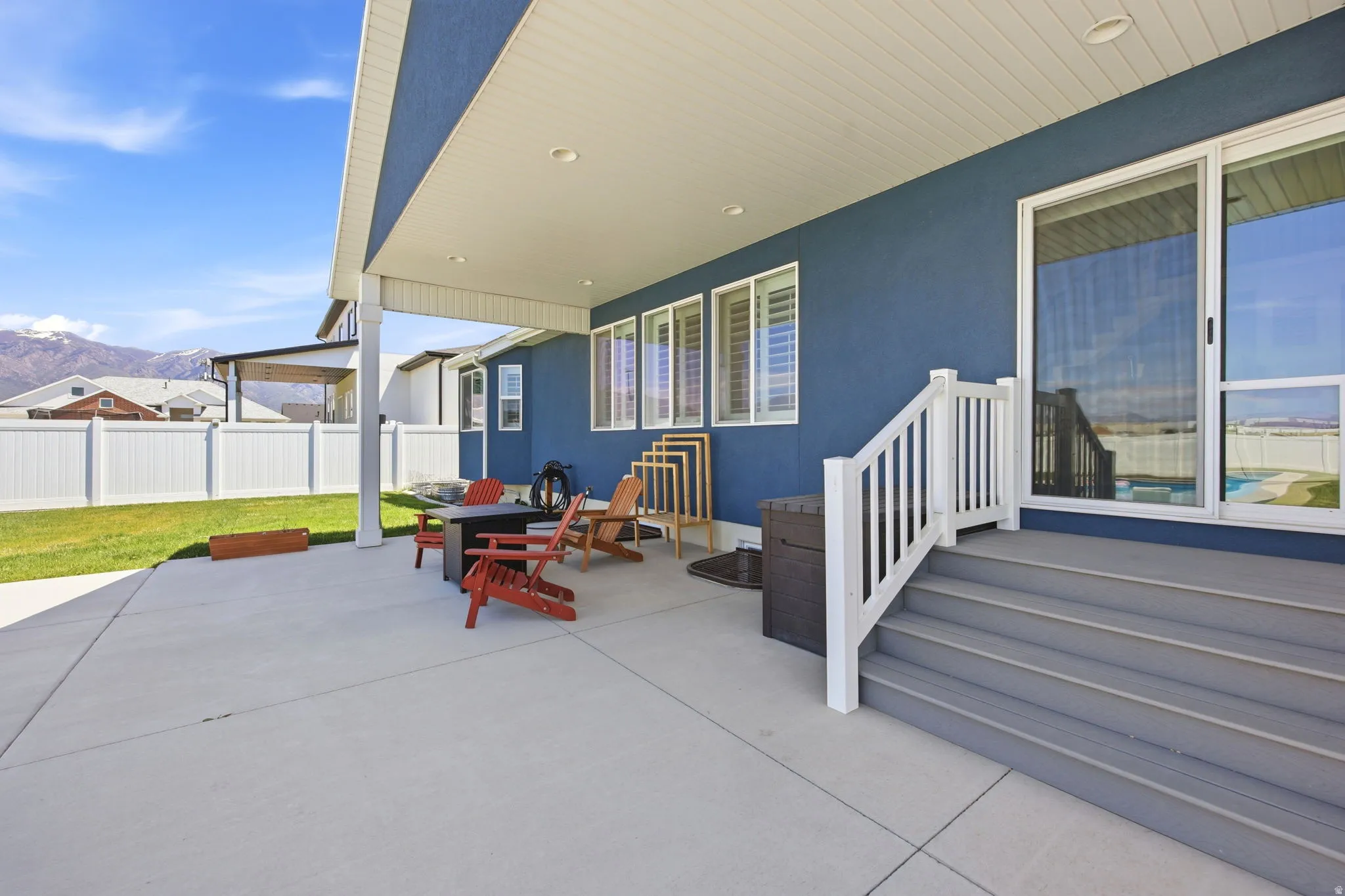 Spacious covered patio with concrete flooring