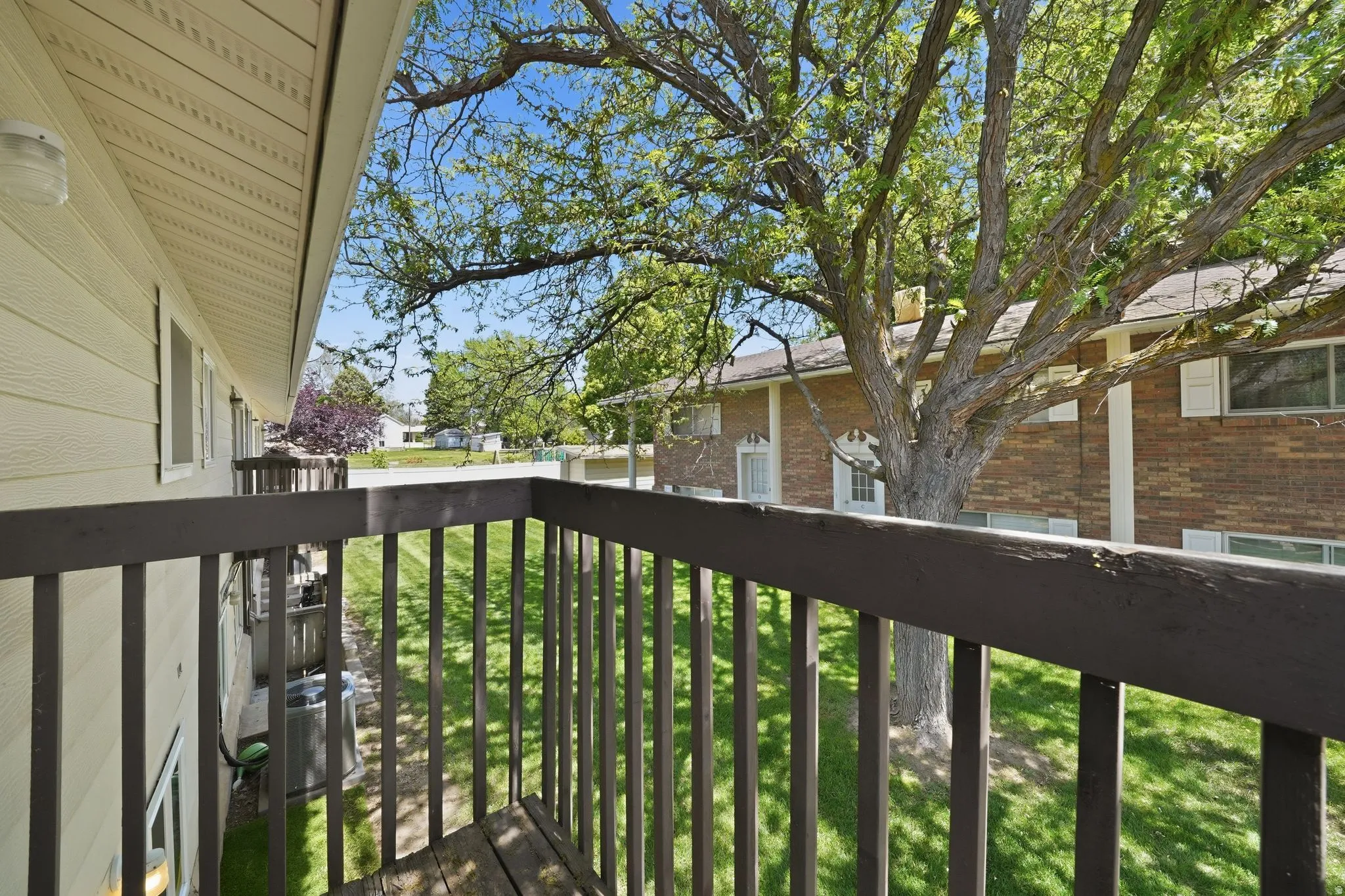 Private balcony with wood railing