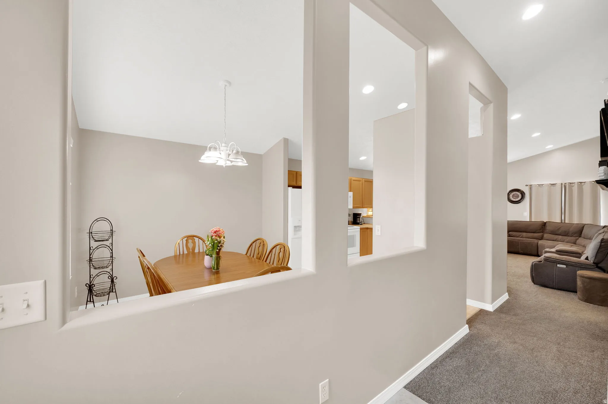 Defined architectural wall openings separate distinct areas