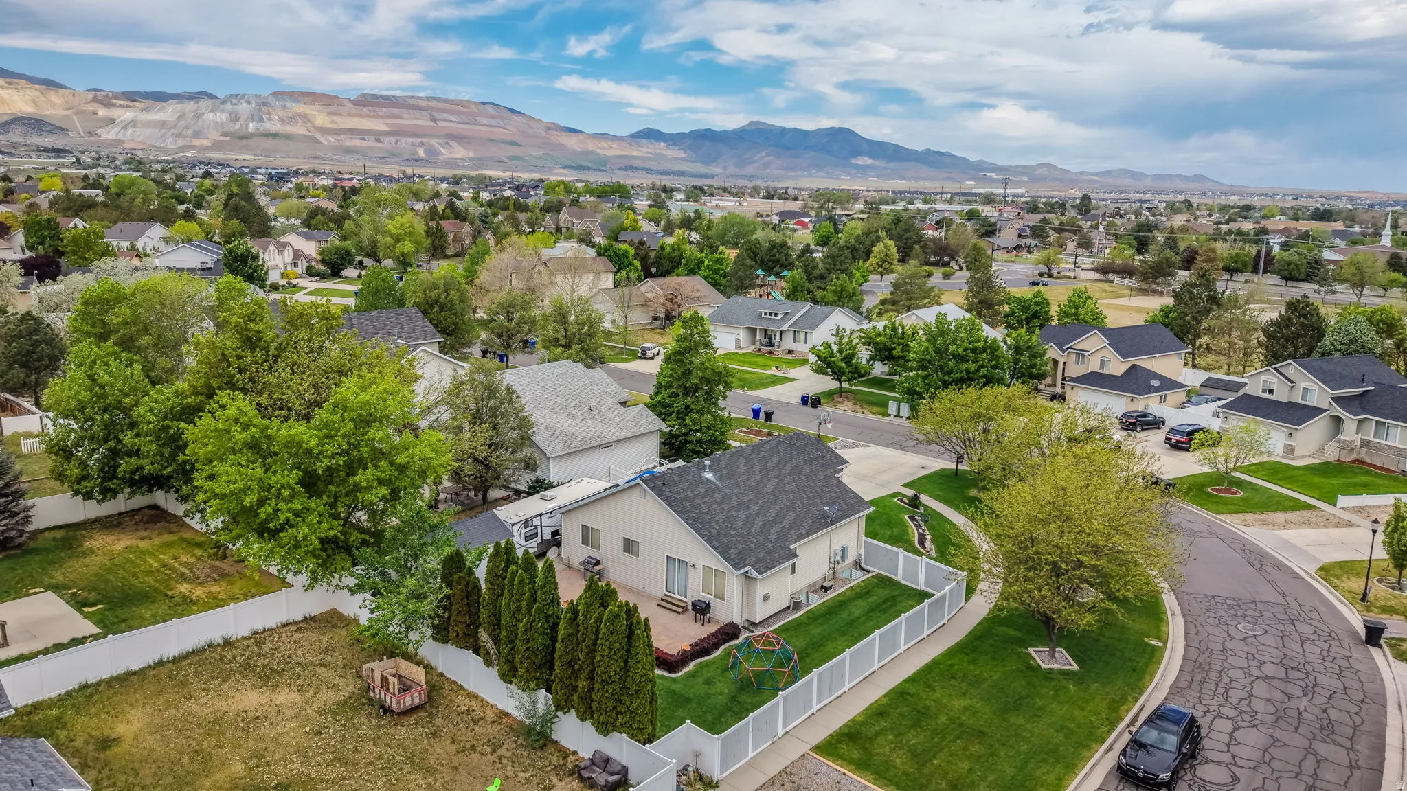 Residential neighborhood showcasing varied home styles and mature landscaping