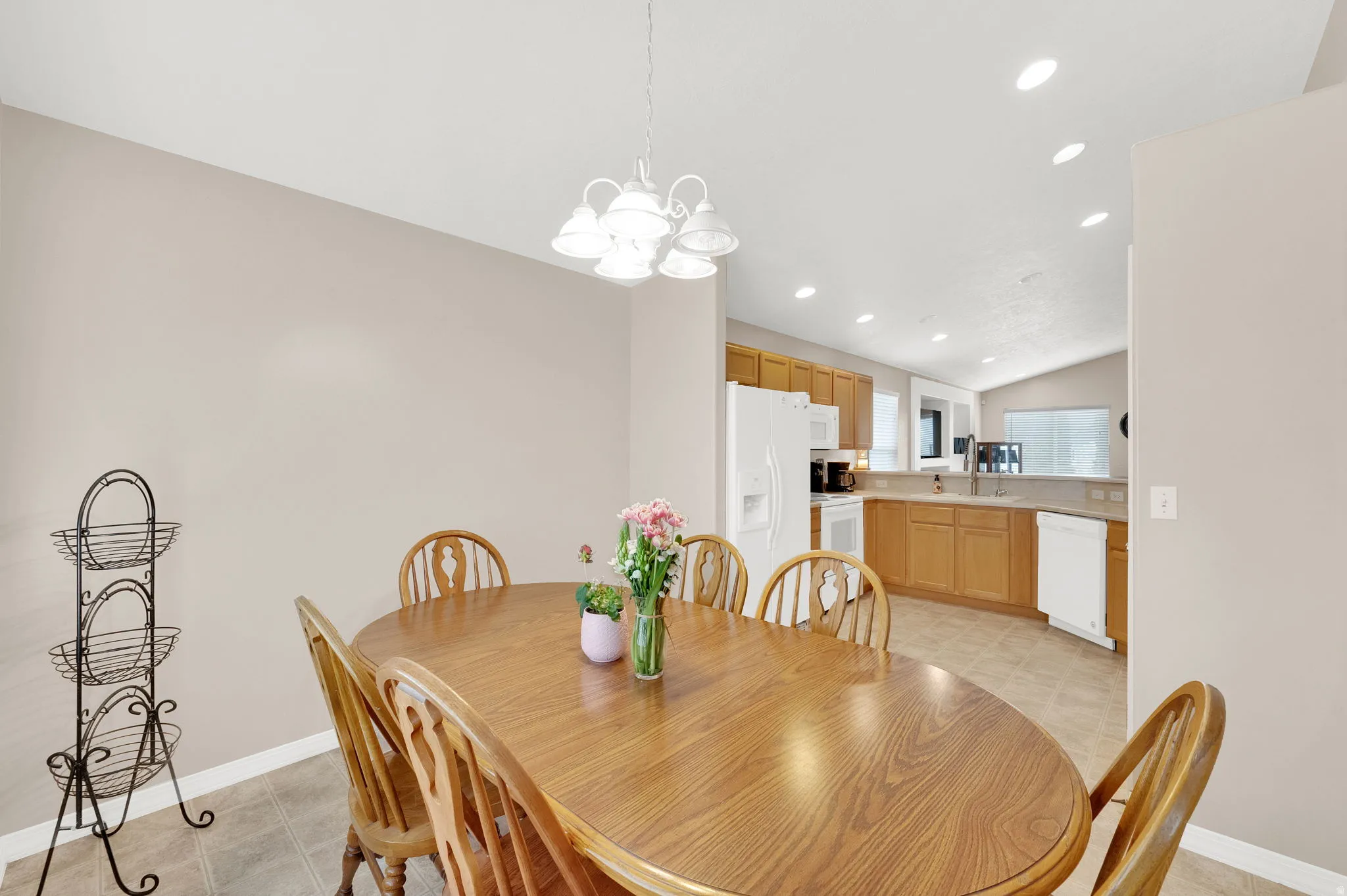 Dining area with neutral wall tones and tile flooring