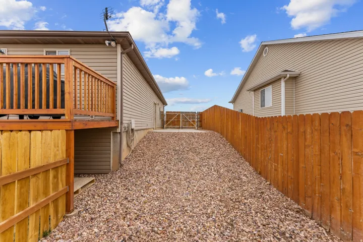 Elevated wood deck with baluster railing