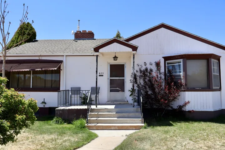 White exterior with brown trim accents