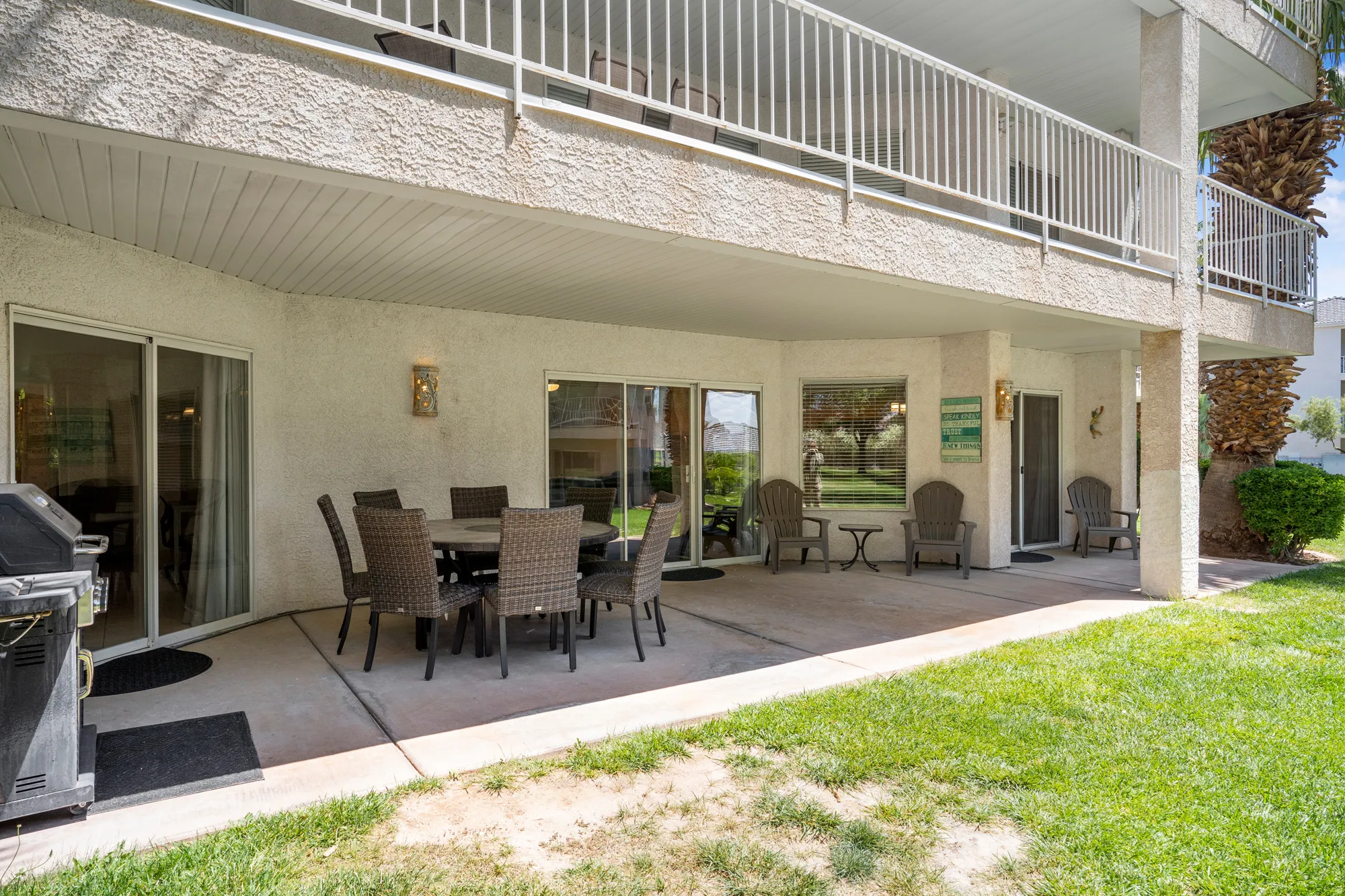 Ground-level covered patio with concrete flooring