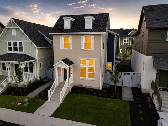 Contemporary two-story residence featuring a stucco and siding exterior