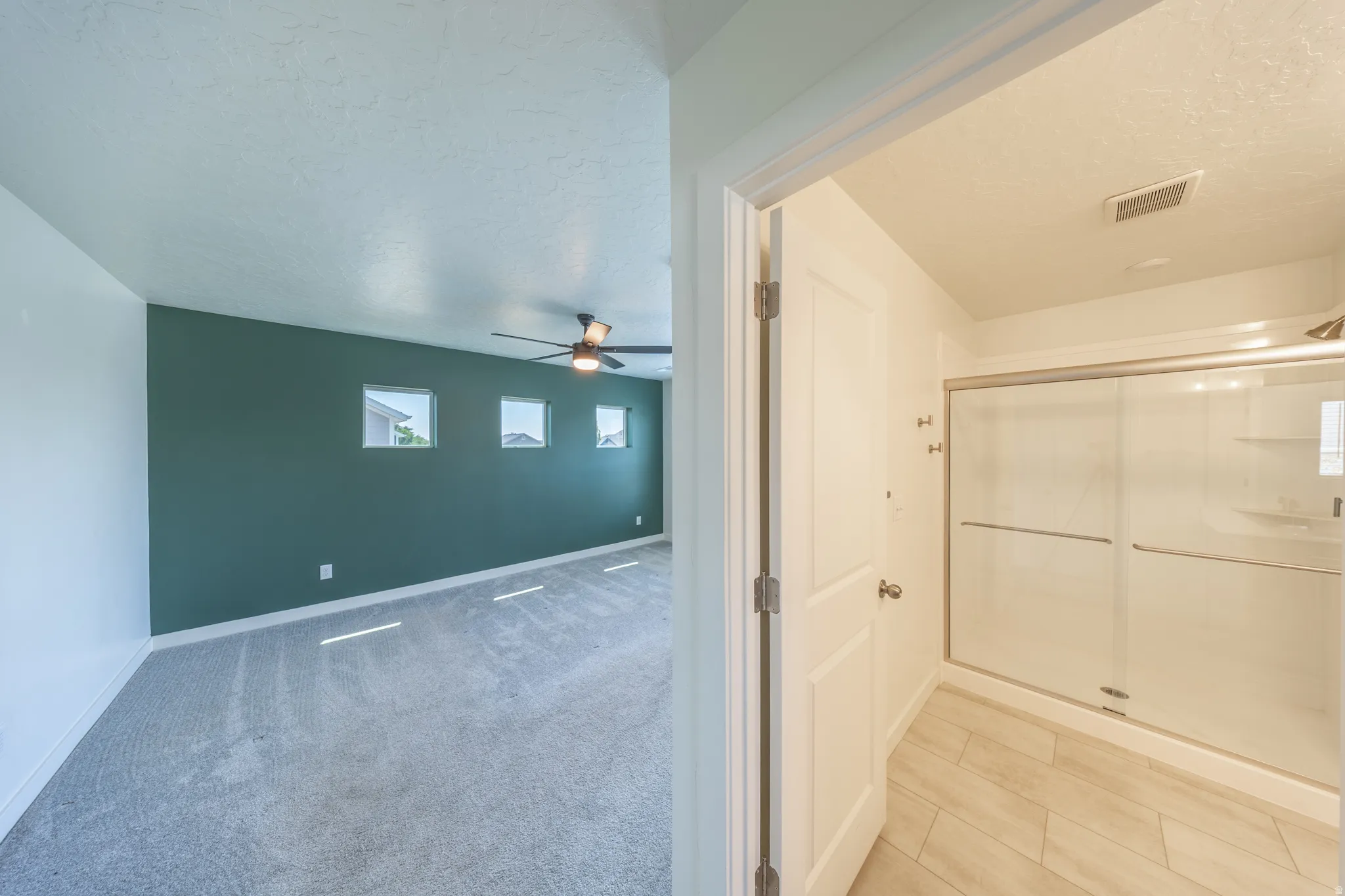 Primary bedroom and bathroom