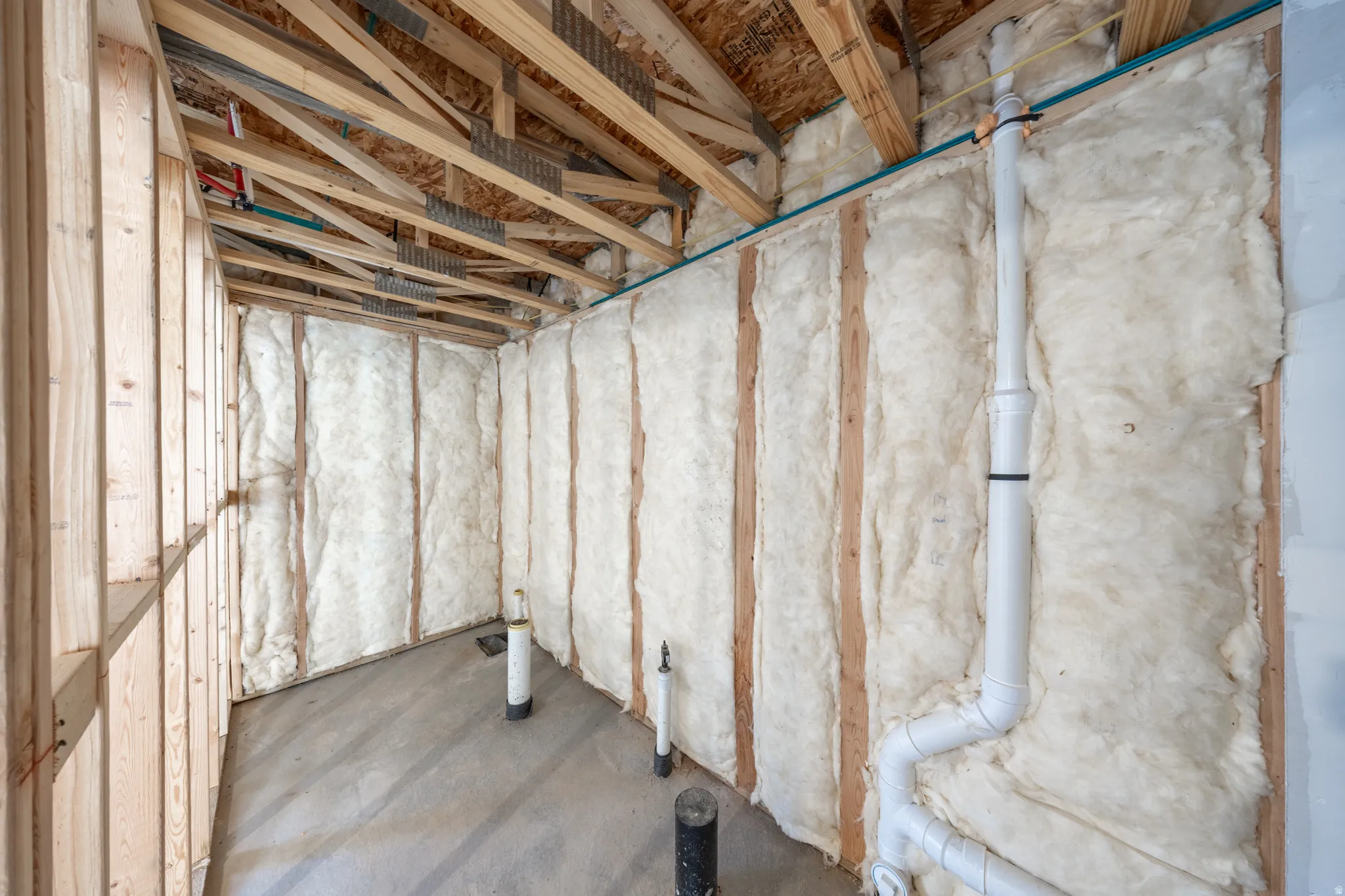 Unfinished basement, roughed for future bathroom