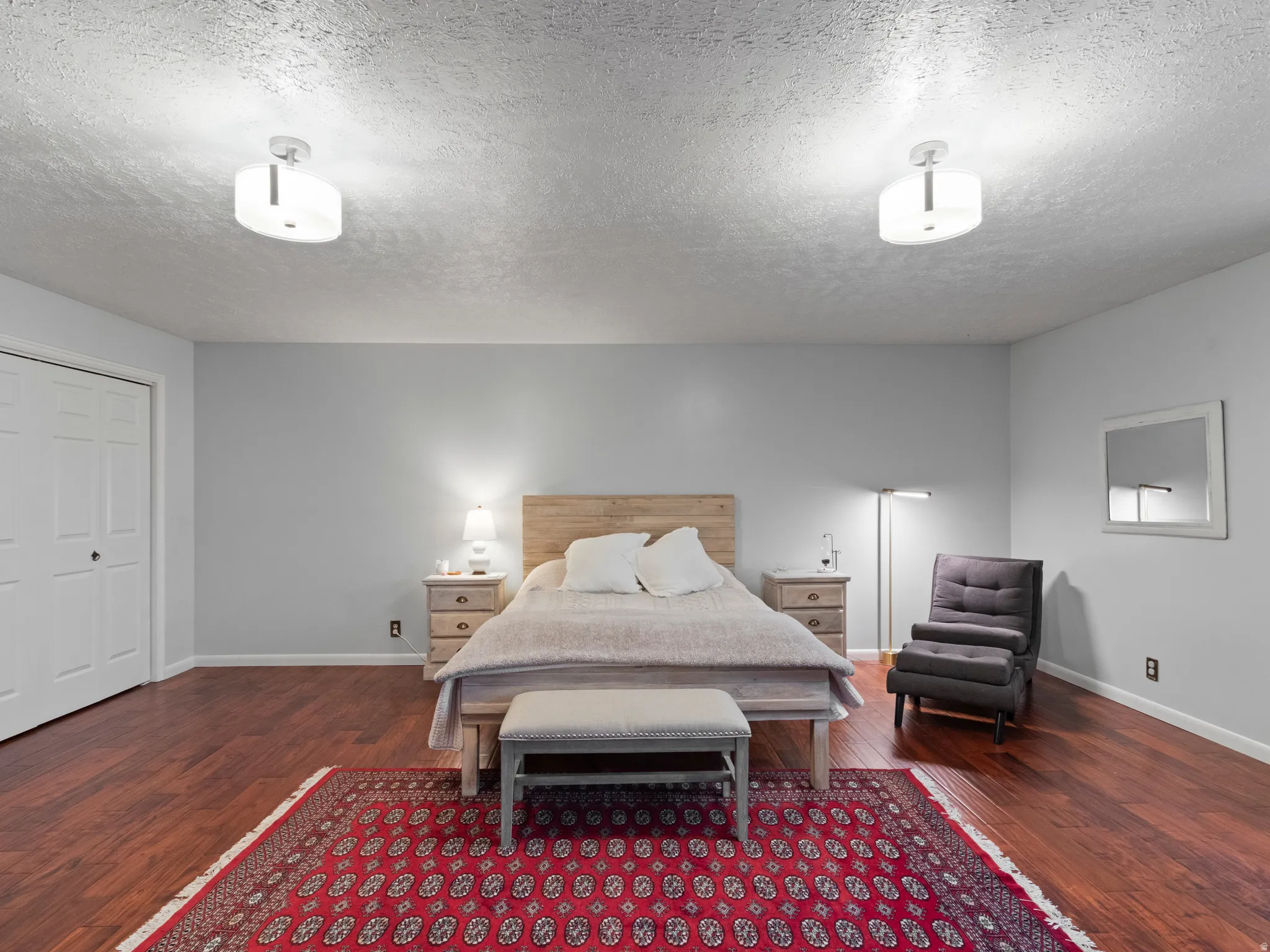Master Bedroom featuring wood-finish flooring and light gray painted walls
