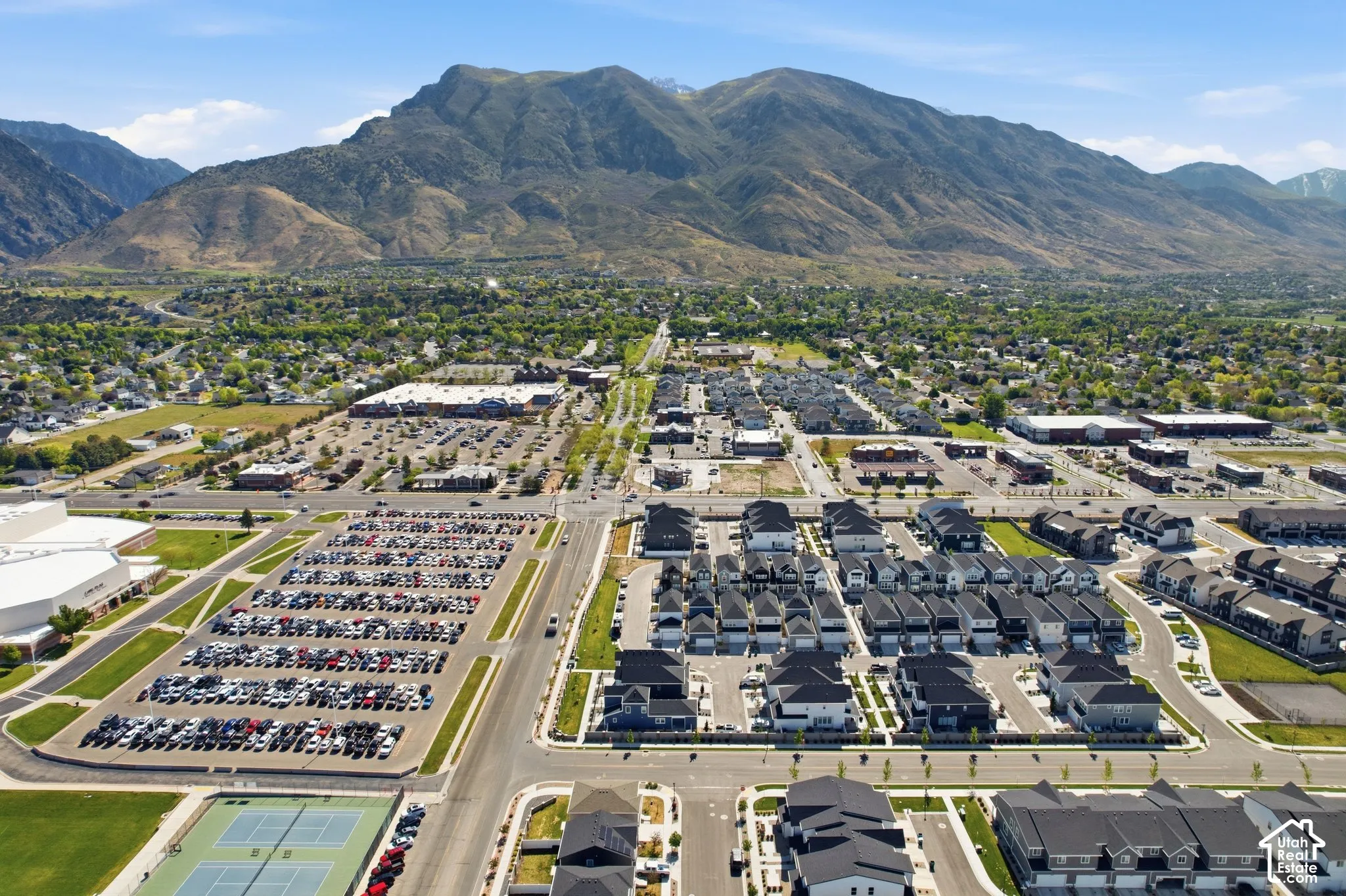 Extensive residential and commercial development with prominent mountain backdrop