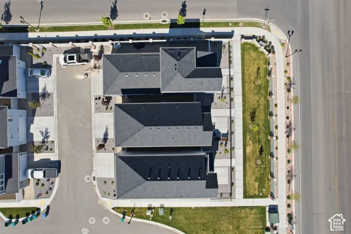 Aerial view showcasing a community layout with multiple properties
