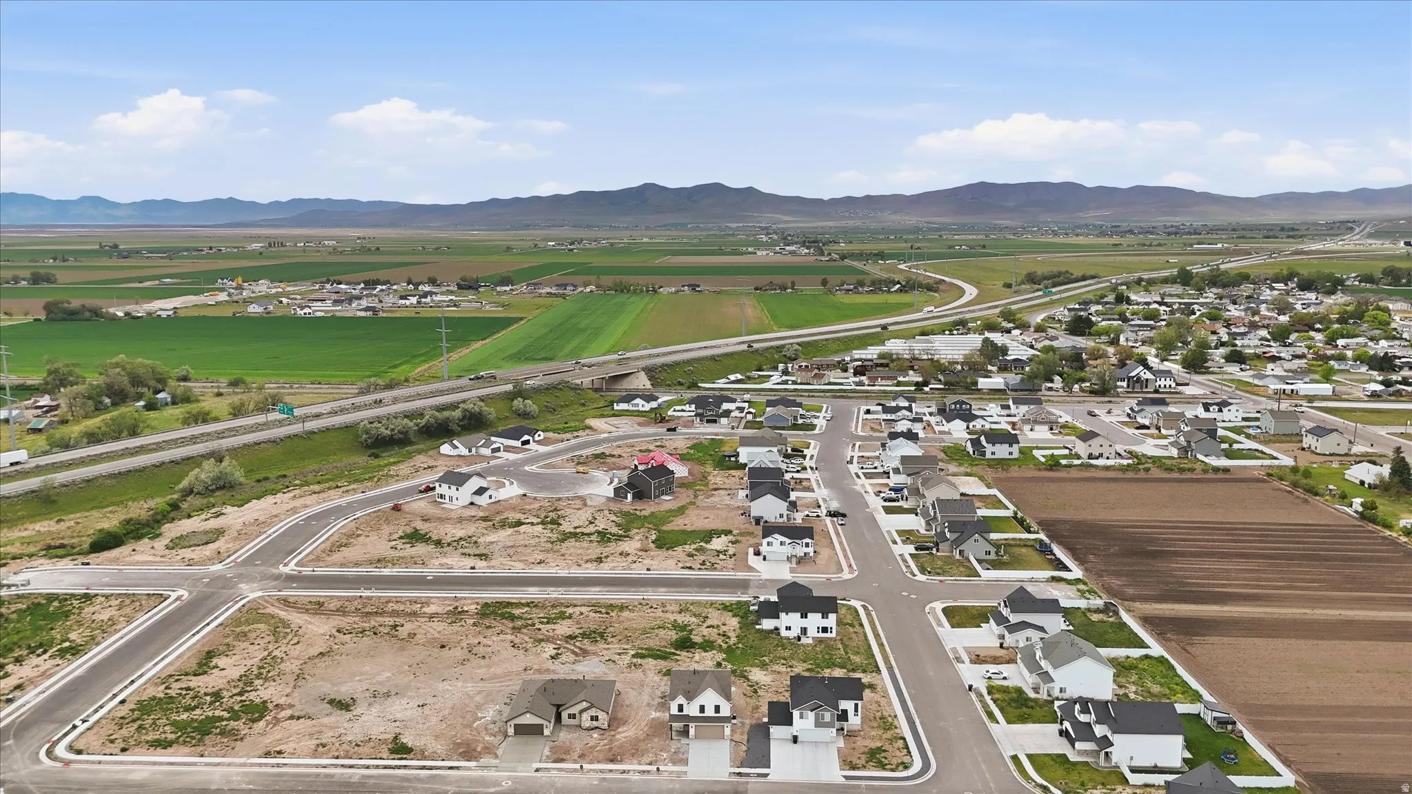 Expansive aerial capturing a developing residential community