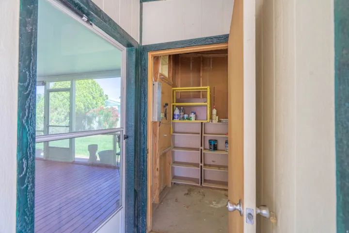 Screened porch with wood-finish flooring