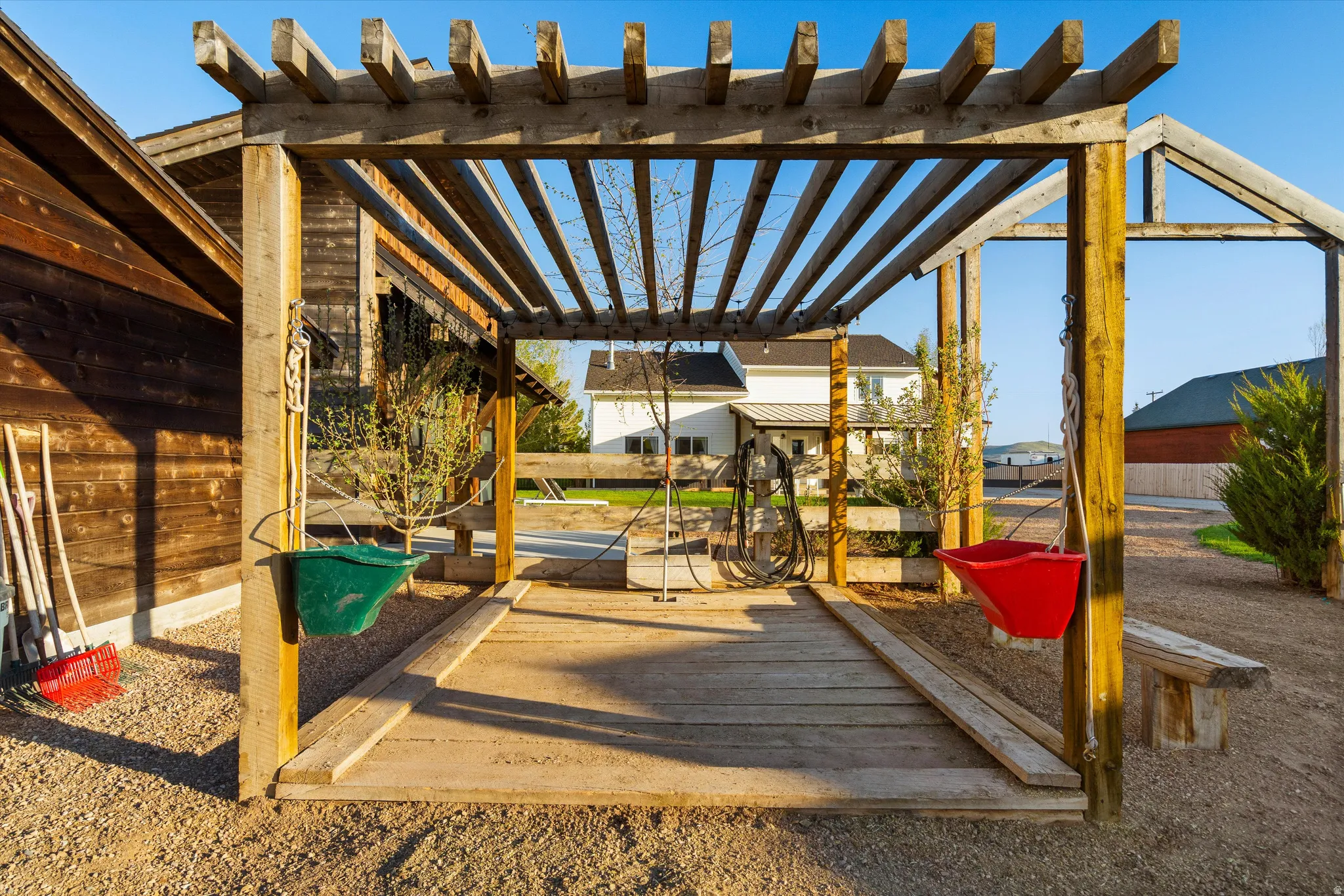 Wood pergola structure with slatted roof
