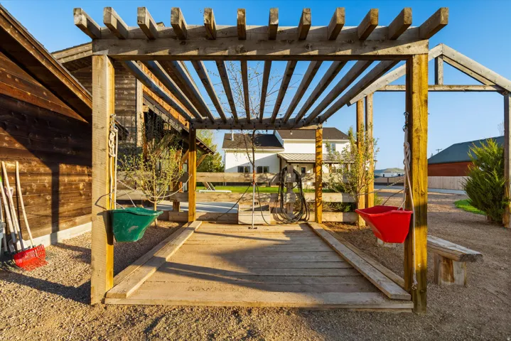 Wood pergola structure with slatted roof