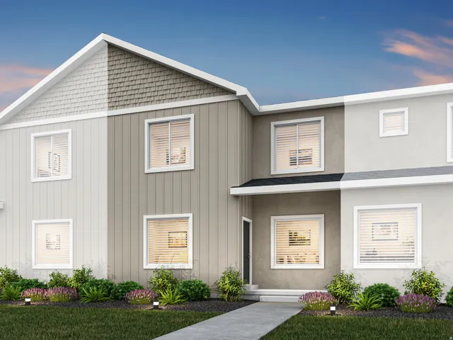 Modern multi-level exterior with varied siding textures including horizontal panels and shingle accents