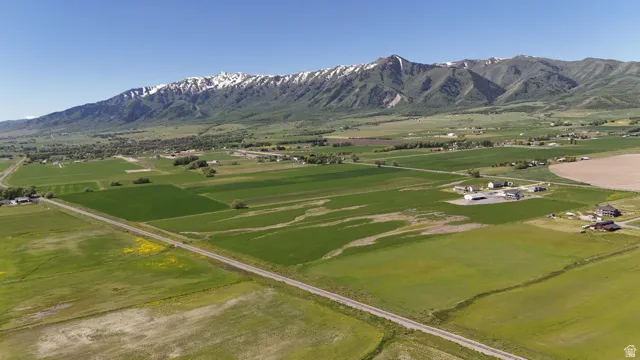 Expansive rural land with a clear blue sky overhead