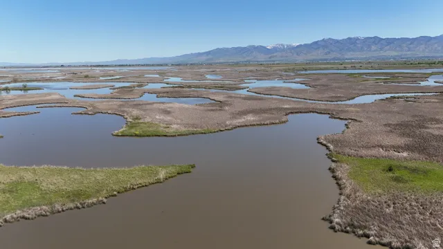 Expansive wetland landscape with numerous water bodies and marshy islands