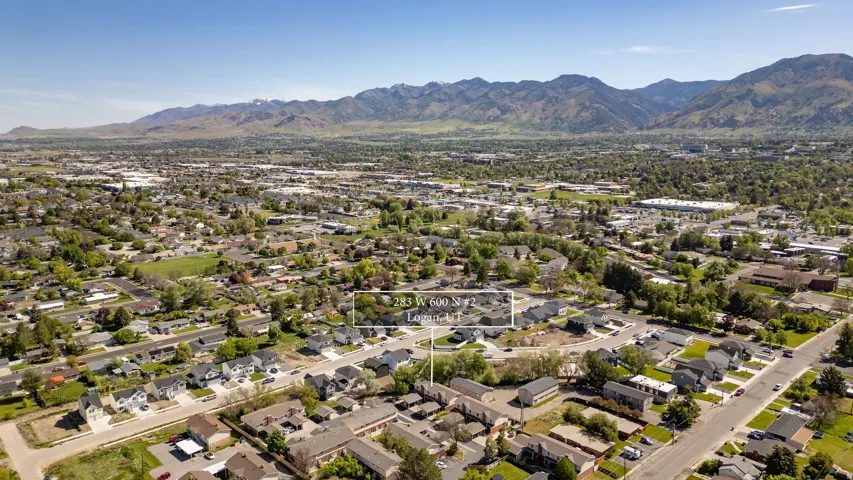 Aerial perspective showcasing residential properties within an established neighborhood setting