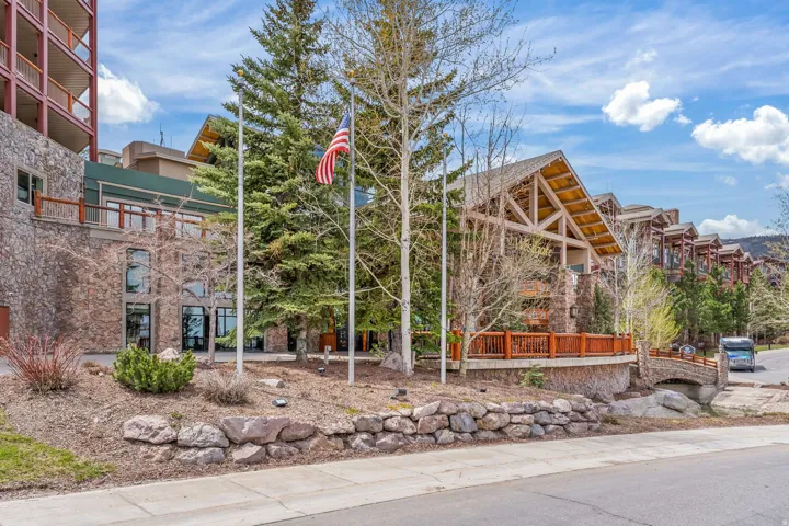 Stone and timber frame exterior architecture with multiple balconies