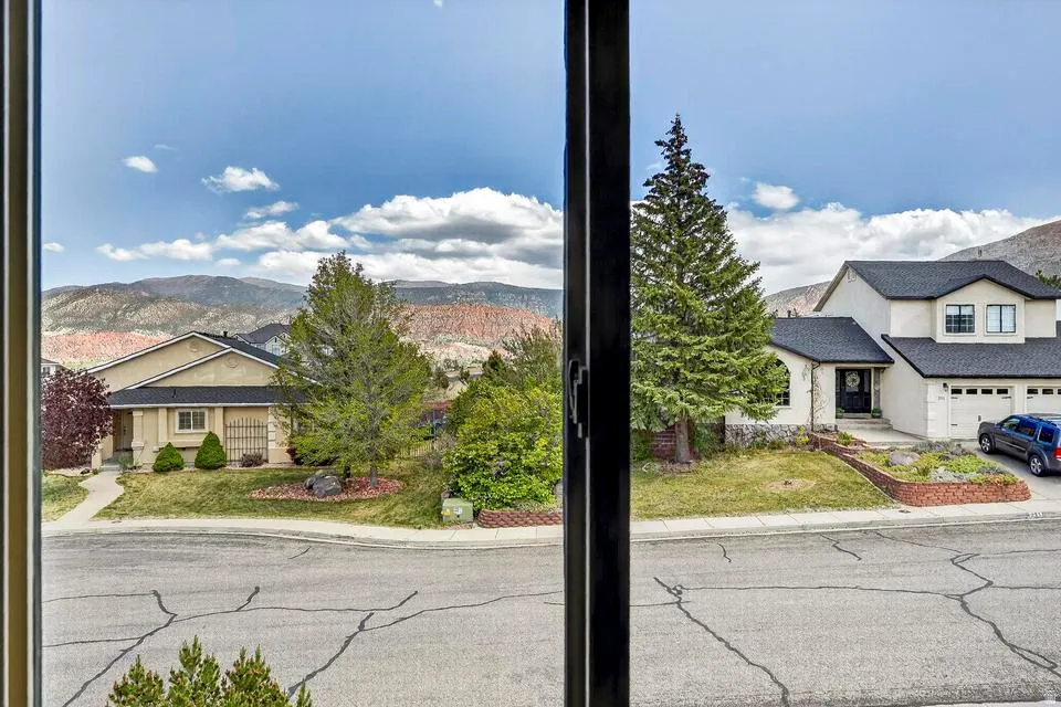 Mountain backdrop visible through expansive windows