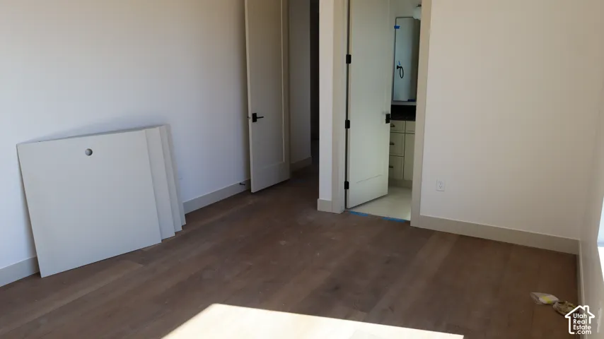 Wood-finish flooring with crisp white walls