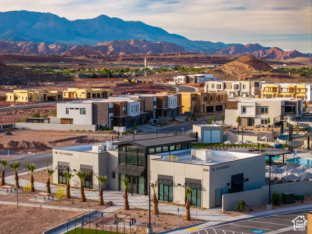 Modern residential community featuring contemporary architecture and a recreational pool area