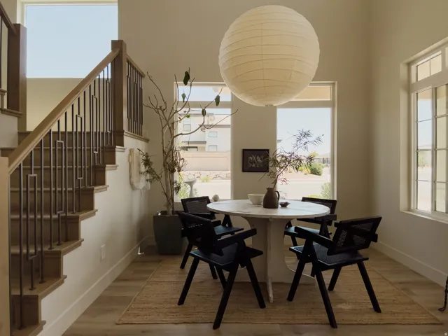 Open-concept living space with wood-finish flooring