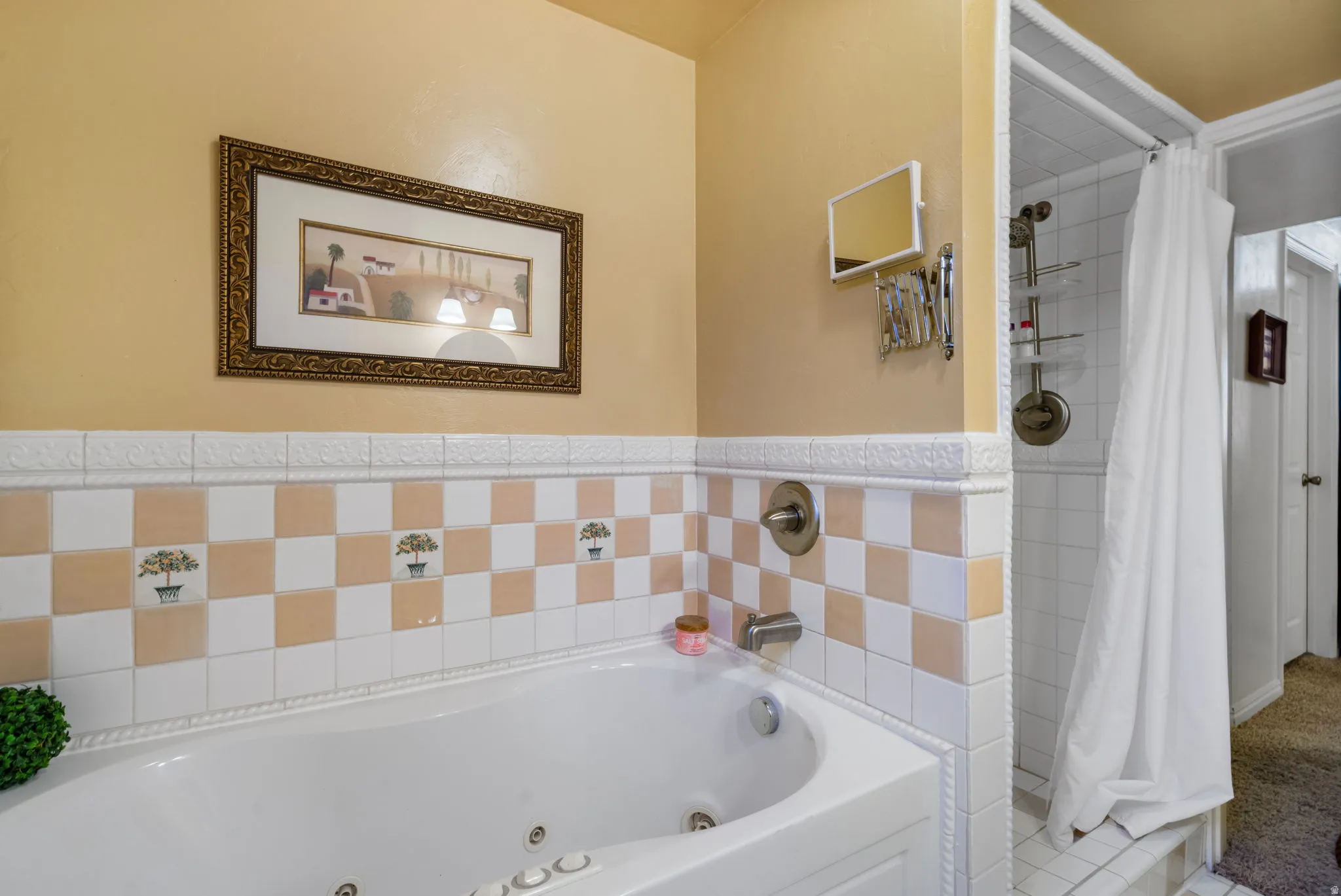 Built-in jetted tub with checkerboard ceramic tile surround