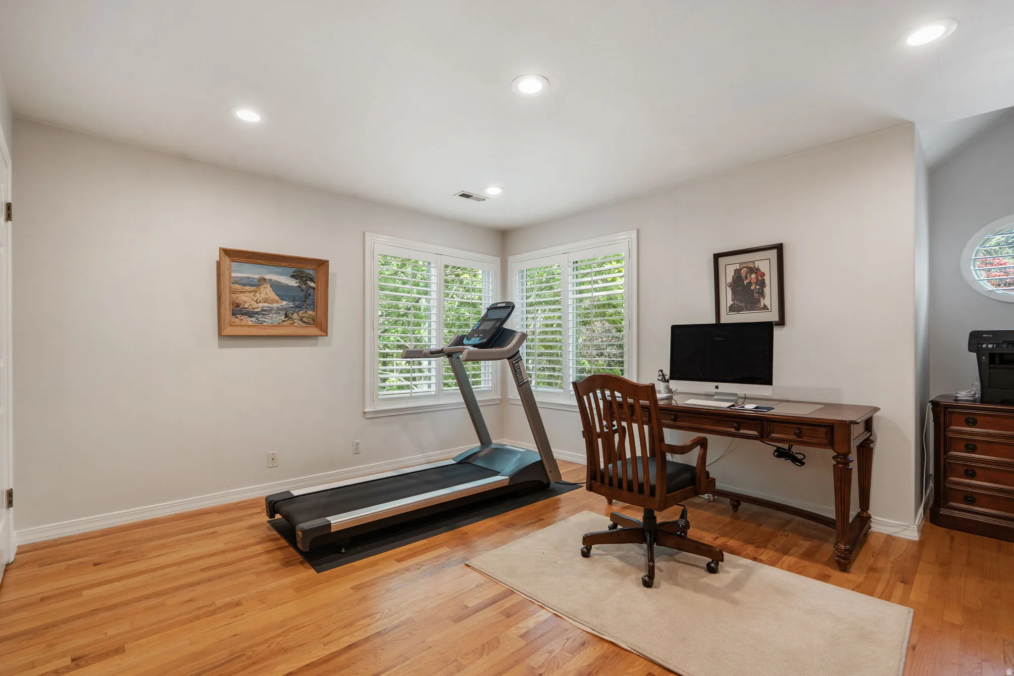 Bedroom with hardwood flooring