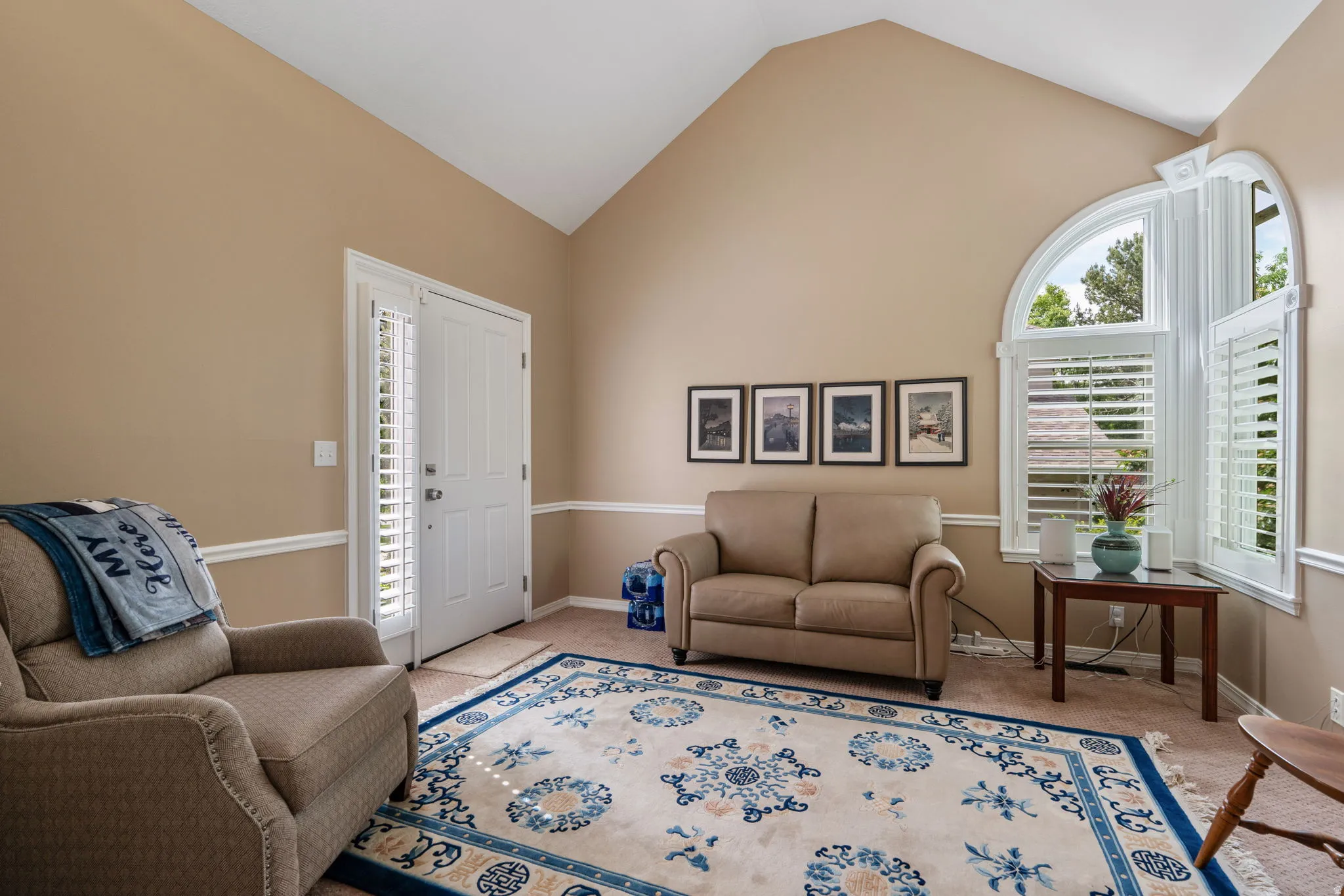 Guest suite with outdoor access and vaulted ceilings