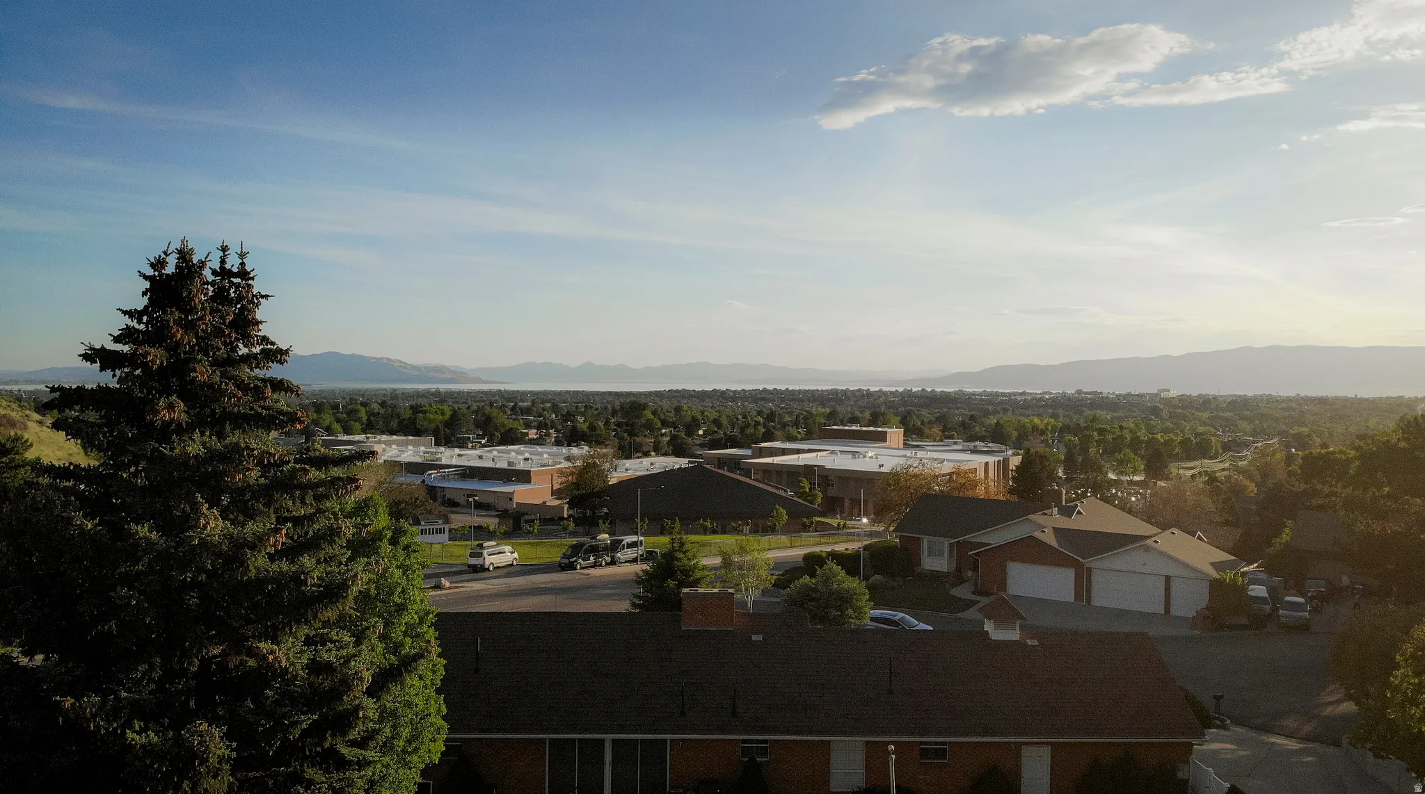 Expansive landscape featuring distant mountains and a broad sky