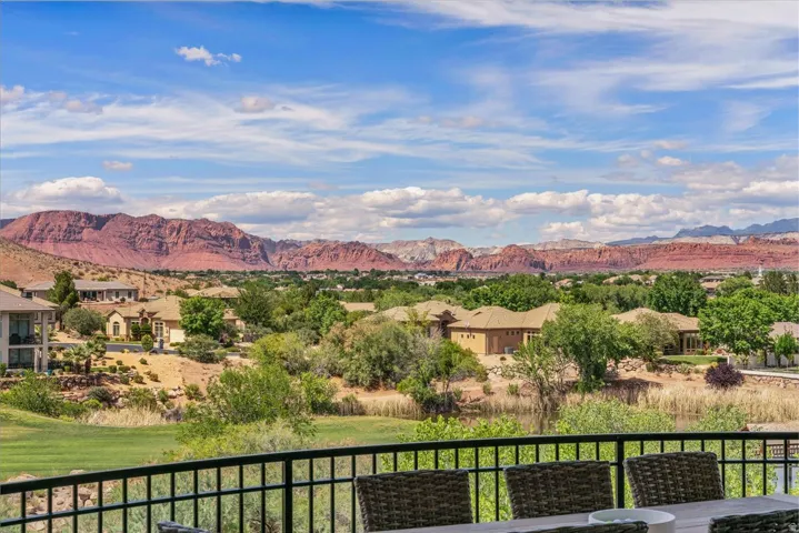 Expansive desert landscape with red rock formations - view from the upper deck