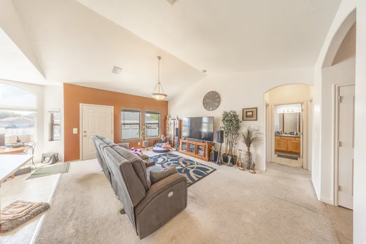 Open family room with vaulted ceilings