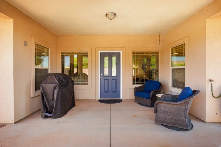 Covered outdoor patio with a concrete surface