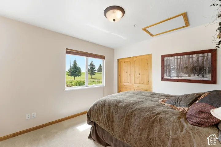 Double window framing a pastoral landscape