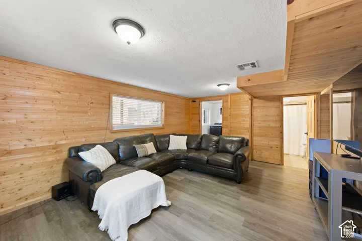 Wood-paneled walls and ceiling accents